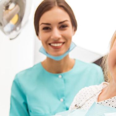A little girl with a dentist
