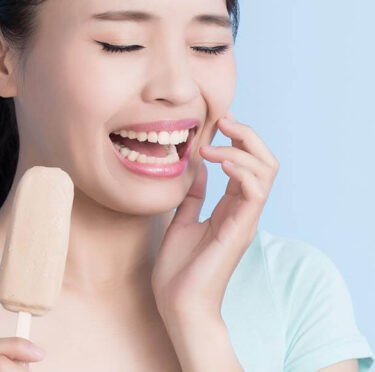 A lady with sensitive teeth