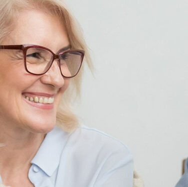 A couple discussing with dentist