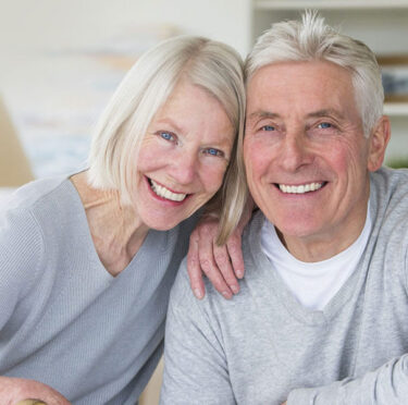 Old couple smiling