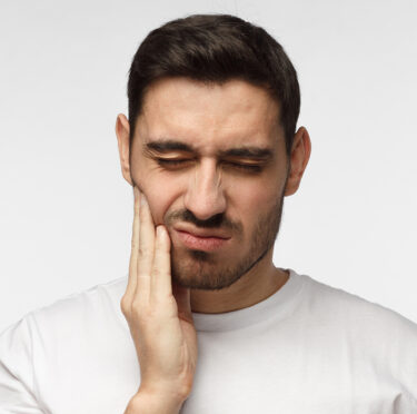 Man having oral problem