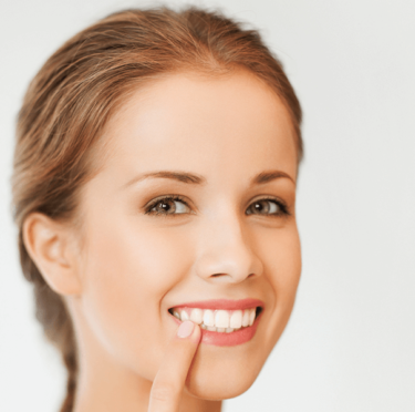 A girl showing her teeth