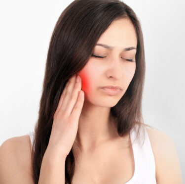 A lady having tooth pain