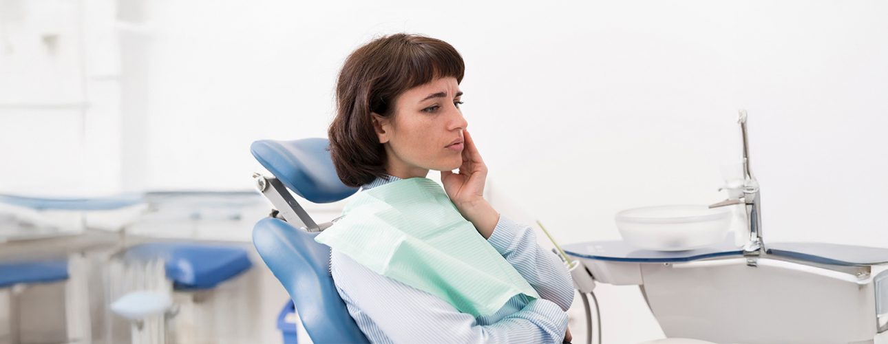 Patient in dental chair at Pearly Whites of Pearland, dentist office in Pearland TX.